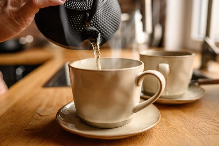 pouring-hot-water-from-kettle